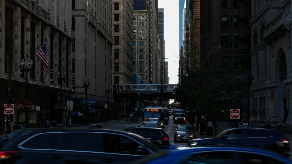 Chicago downtown street with heavy traffic and tall buildings