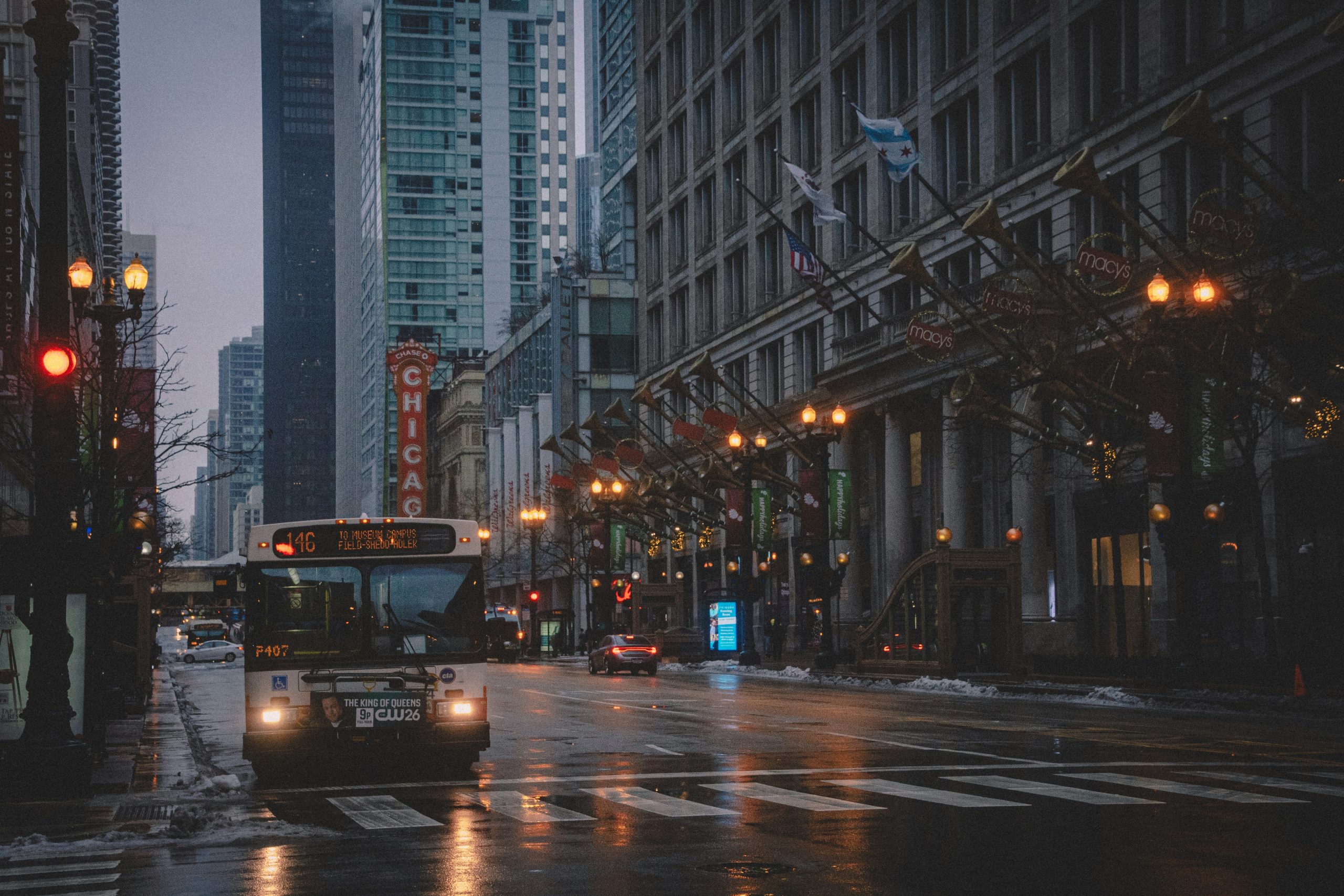Night traffic on a Chicago street with city lights