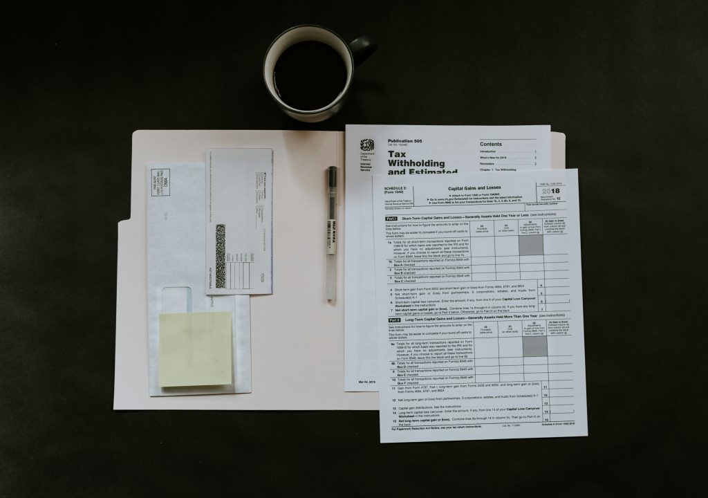 Medical paperwork and bills on a desk